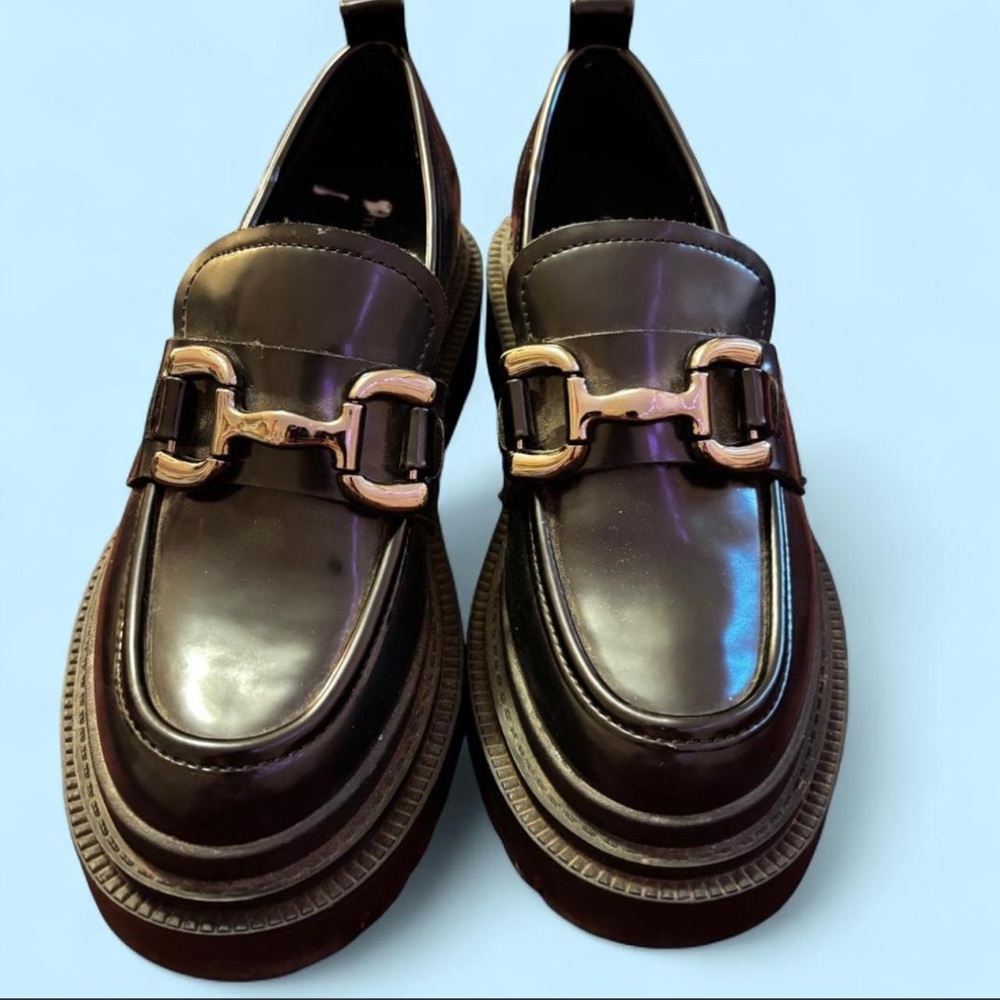 Woman's Black Loafers with Gold Buckle